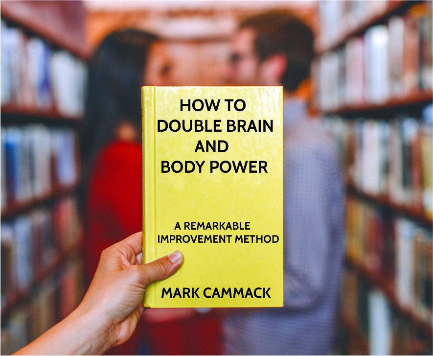 person holding up copy of book How To Double Brain And Body Power in book store