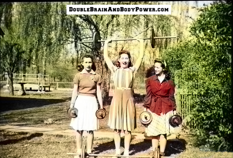 Three young ladies outside in a yard with green bushes and trees nearby. Two ladies are each holding a pair of dumbbells, and the one in the center of the photo is holding a barbell overhead.